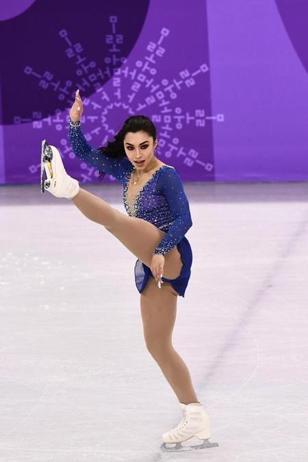 Olympic mùa Đông “dậy sóng” vì nữ vận động viên quá đỗi sexy trên sân băng - 2 Bông hồng đến từ Canada được nhận xét là rất giống với…