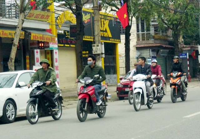 Ngày Tết, tại Nghệ An dễ dàng bắt gặp những hình ảnh như thế này trên các tuyến đường (ảnh chụp tại TP Vinh, Nghệ An)