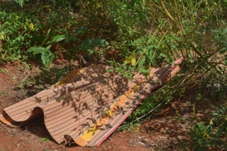 Điều tra vụ thi thể người đàn không mặc quần áo phân hủy trong rẫy - 1
Hiện trường nơi phát hiện thi thể người đàn ông (ảnh VKSND Đắk Lắk)