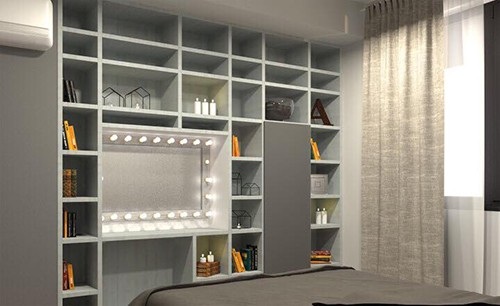 Chốn đi về sang trọng, ấm cúng của Hoa hậu chuyển giới Quốc tế Hương Giang - 16 Chiếc tủ lớn để sách, nến và những đồ dùng trang trí và cũng gắn luôn bàn trang điểm trong đó.