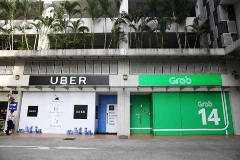 Tài xế lo mất việc, vỡ nợ, bán xe khi Uber bị Grab “thâu tóm“ - 1 Tài xế lo mất việc, vỡ nợ, bán xe khi Uber bị Grab “thâu tóm“ - 1