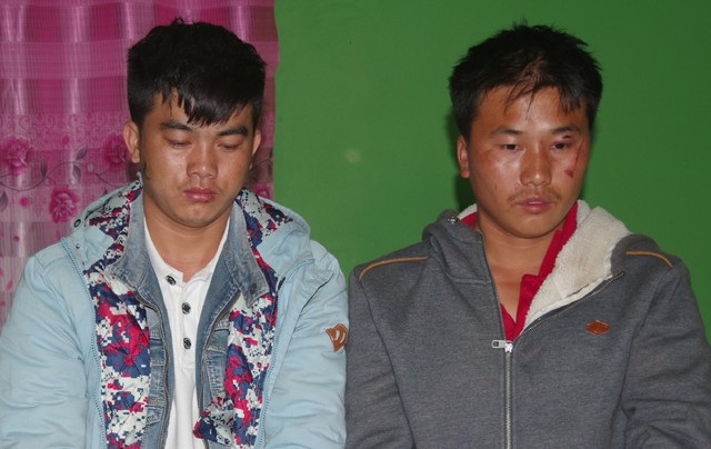 Chặn đứng đường dây ma túy "khủng" từ Lào sang Việt Nam - 1 Hai anh em Chơ Già, Chăn Già tại Công an tỉnh Xiêng Khoảng (ảnh BĐBP cung cấp)