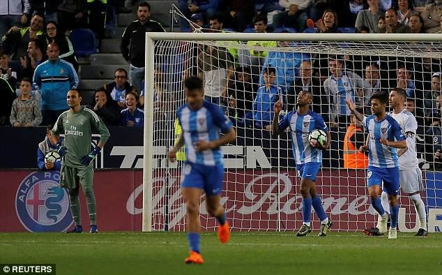 Isco lập siêu phẩm, Real Madrid soán vị trí của Valencia - 4
Rolan ghi bàn danh dự cho Malaga ở cuối trận