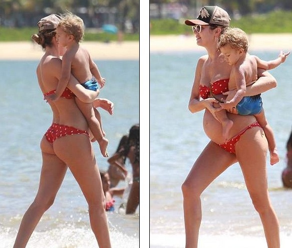 Candice Swanepoel "bế bụng" đi nghỉ mát - 3
Trông cô vẫn thon thả, nhanh nhẹn và năng động