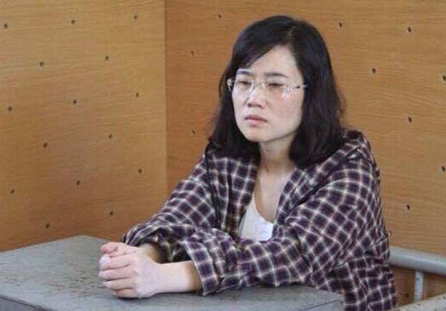 "Hot girl" ngân hàng biển thủ hơn 50 tỷ đồng, kéo 15 đồng nghiệp vào vòng lao lí - 1 Nguyễn Thị Lam thời điểm bị bắt giữ (21/9/2016)