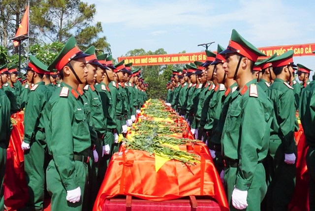 An táng 98 hài cốt liệt sĩ hi sinh ở nước bạn Lào - 6 An táng 98 hài cốt liệt sĩ hi sinh ở nước bạn Lào - 6