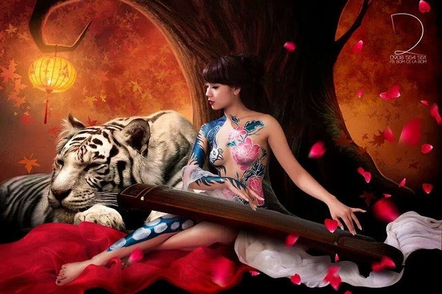 Vụ hoạ sĩ bị tố hiếp dâm người mẫu: Giới người mẫu body painting lên tiếng - 1 Một trong những bức ảnh body painting của hot girl Nga Tây gây sốt cộng đồng mạng nhiều năm trước.