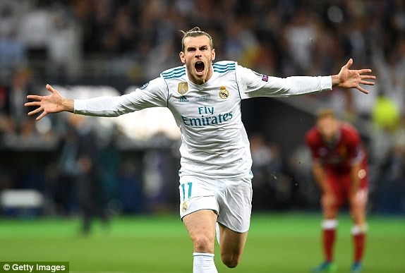 Real Madrid 3-1 Liverpool: Cú đúp của Gareth Bale - 6
Niêm vui của Bale sau bàn thắng nâng tỷ số lên 2-1