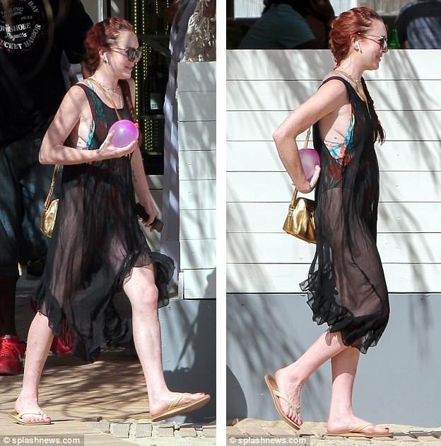 Lindsay Lohan tái xuất sau một thời gian "ở ẩn" - 8