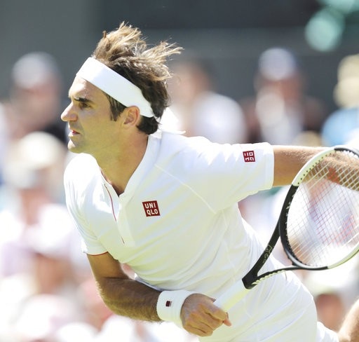 Wimbledon: Federer thắng nhanh, Dimitrov bị loại sớm - 1
Federer đã có chiến thắng dễ dàng ở trận đầu