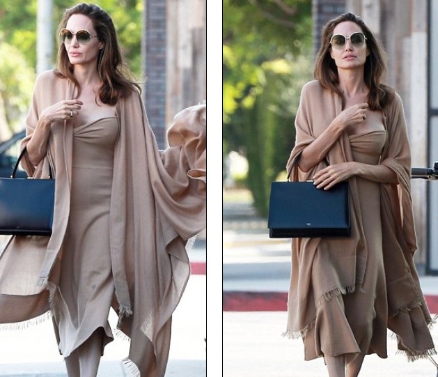 Angelina Jolie gợi cảm ra phố cùng Pax Thiên - 3 
Màu nude là một trong những tông màu mà Jolie rất yêu thích và thường mặc