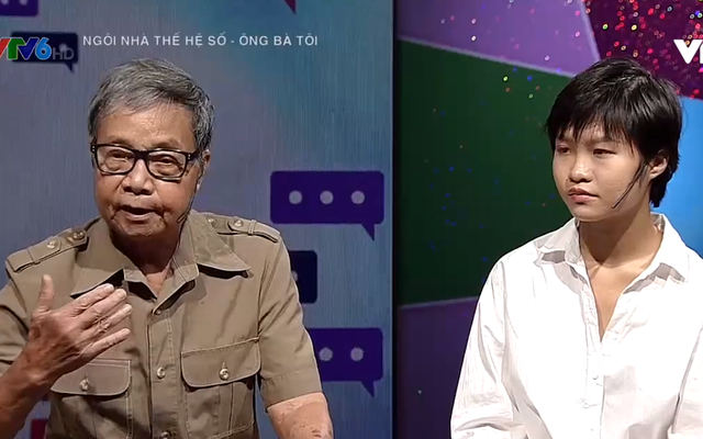 Ông Nguyễn Công Vị và cháu nội Thục Anh. Ảnh: VTV.