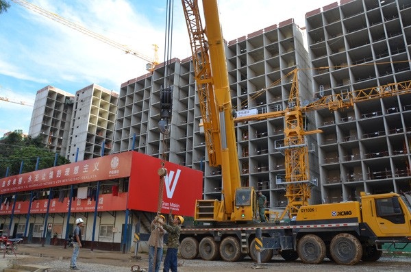 Trung Quốc bành trướng ảnh hưởng tại sân sau của Mỹ - 1 Công nhân Trung Quốc tại một công trình ở Venezuela (Ảnh minh họa: Xinhua)