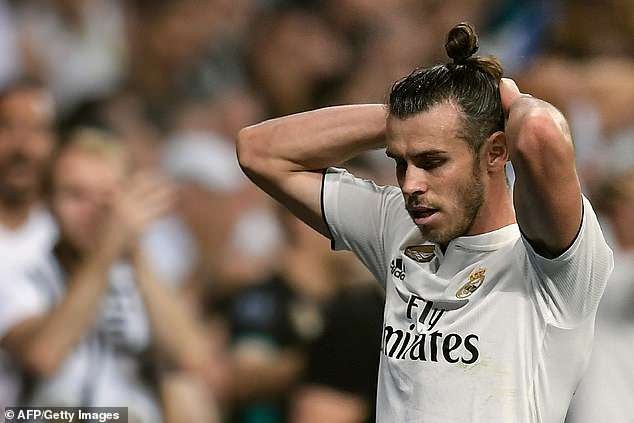 Real Madrid bất phân thắng bại với Atletico tại Bernabeu - 7
Nỗi thất vọng của Bale sau khi trận đấu kết thúc
