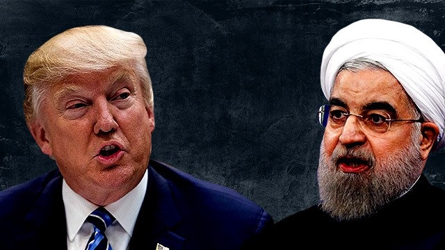 Những nguy cơ tiềm ẩn khả năng bùng nổ trong năm 2018 - 3 Tổng thống Mỹ Donald Trump (trái) và người đồng cấp Iran Hassan Rouhani (Ảnh: AFP)