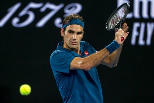 Australian Open: Federer tốc hành, búp bê Sharapova hạ Wozniacki - Ảnh 2. Australian Open: Federer tốc hành, búp bê Sharapova hạ Wozniacki - Ảnh 2.