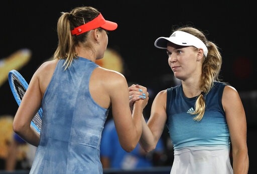 Australian Open: Federer tốc hành, búp bê Sharapova hạ Wozniacki - Ảnh 3. Australian Open: Federer tốc hành, búp bê Sharapova hạ Wozniacki - Ảnh 3.