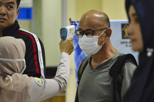 Thế giới “căng mình” ngăn virus corona bùng phát