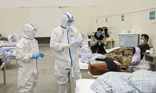 Thành phố Trung Quốc dùng biện pháp “thời chiến” ngăn chặn virus corona