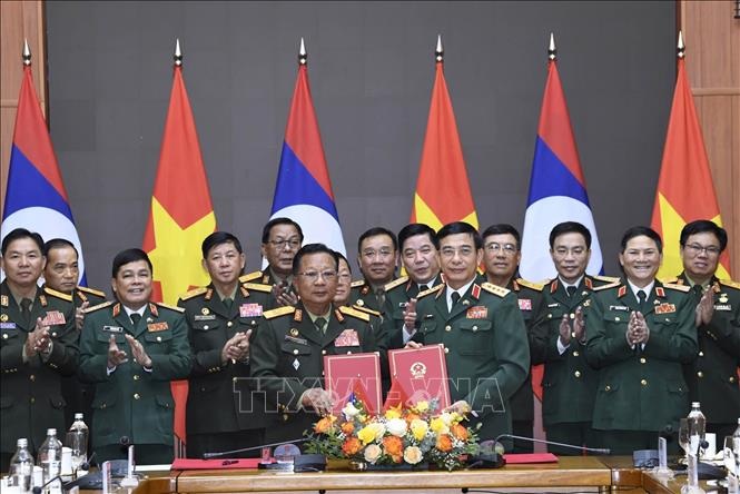 Tổng Bí thư tiếp Phó Thủ tướng, Bộ trưởng Bộ Quốc phòng Lào - 4