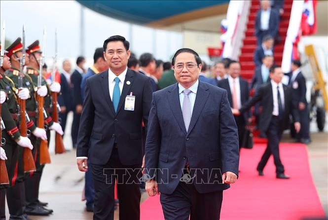 Lễ đón chính thức Thủ tướng Phạm Minh Chính tại Phủ Thủ tướng Lào - 4