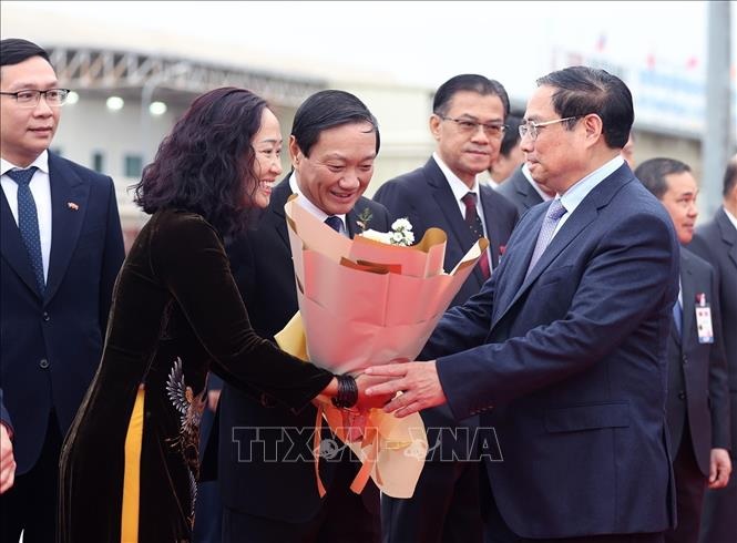 Lễ đón chính thức Thủ tướng Phạm Minh Chính tại Phủ Thủ tướng Lào - 6
