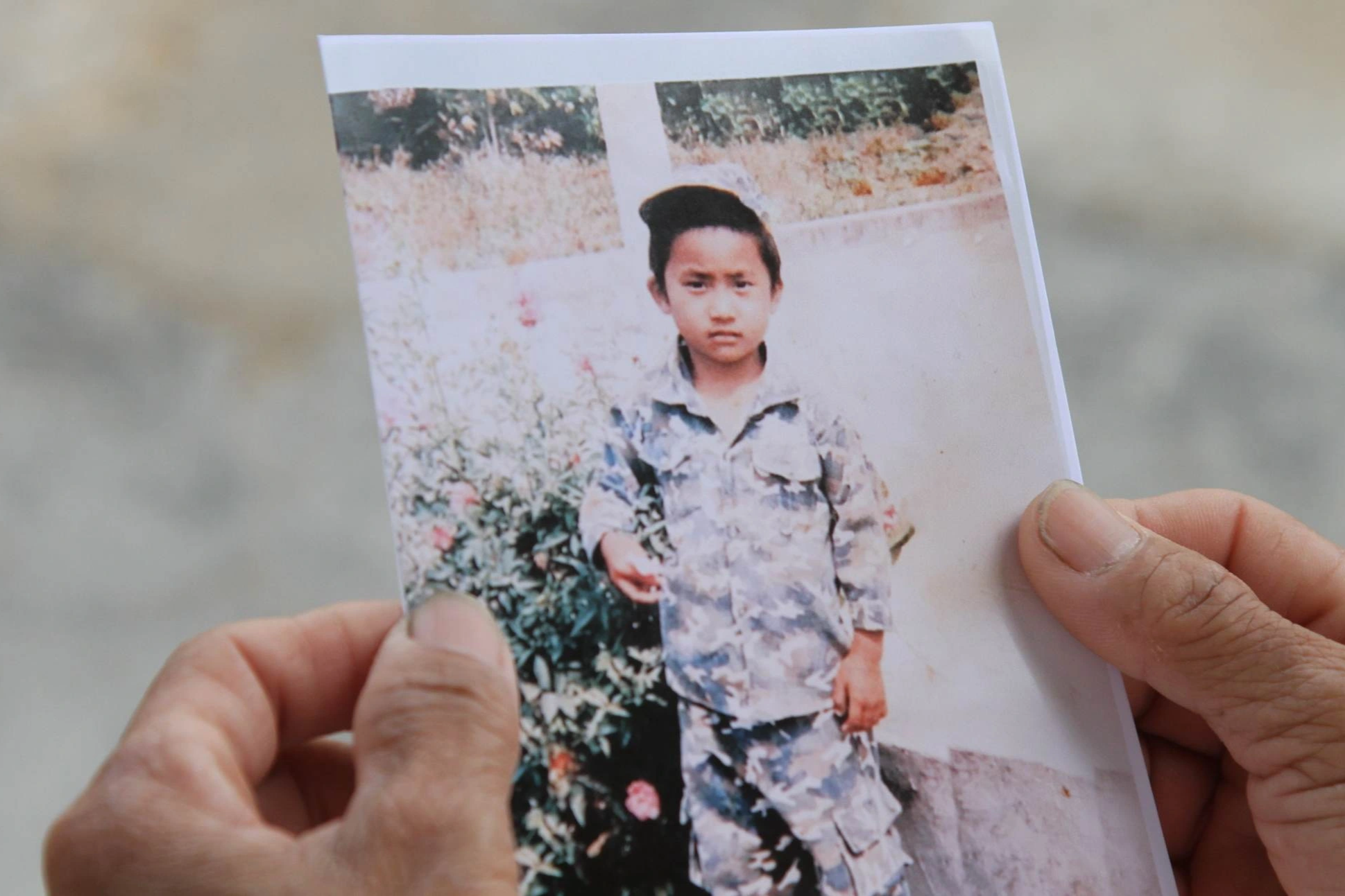 Người mẹ ở Đắk Lắk tìm con trai mất tích 17 năm - 1
