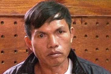 Bị can Poóc đã giết chết chon trai mình vì không có tiền lo cho con về sau. ( Ảnh: Anninhthudo)