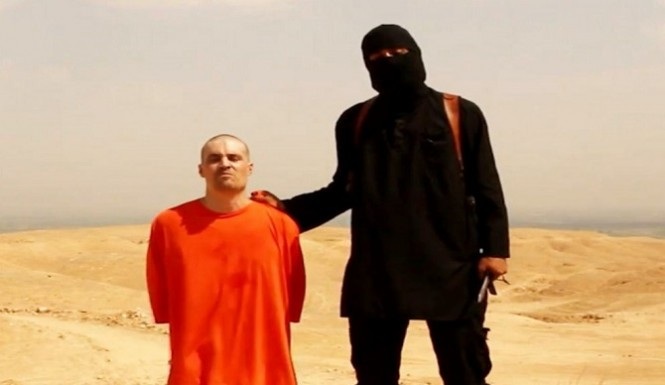 IS rao bán thi thể nhà báo Mỹ với giá 1 triệu USD - 1 Nhà báo Mỹ James Foley đã bị hành quyết hồi tháng 8.