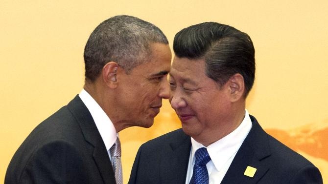 Obama: Ông Tập củng cố quyền lực nhanh, khiến các láng giềng lo ngại - 1 Tổng thống Mỹ Barack Obama và Chủ tịch Trung Quốc Tập Cận Bình tại APEC ở Bắc Kinh hồi tháng 11.