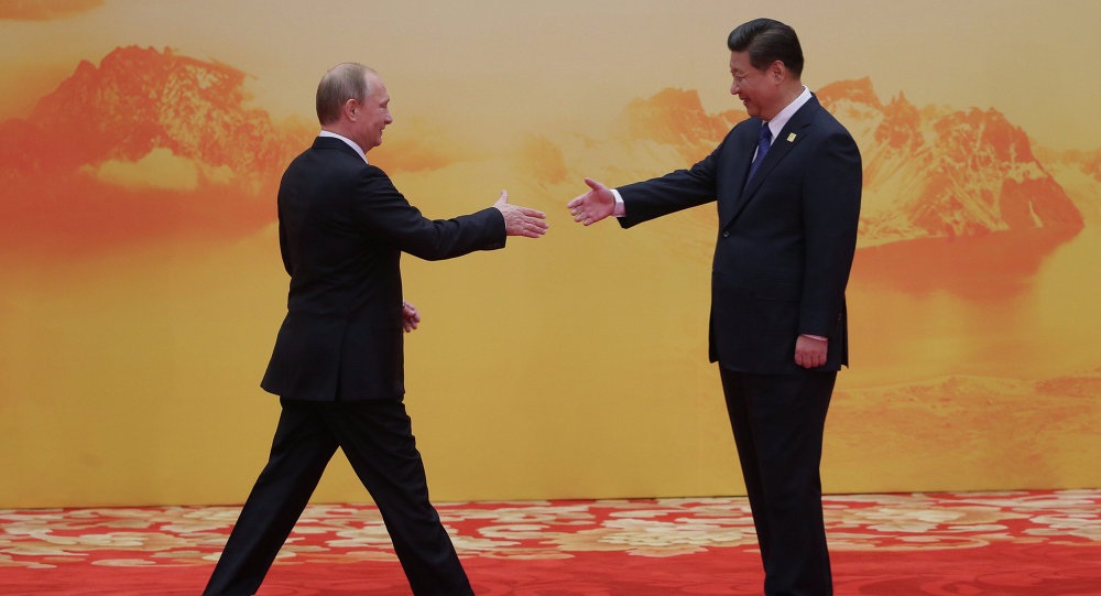 Nga và Trung Quốc thảo luận "Vành đai kinh tế con đường tơ lụa" - 1 Tổng thống Nga Vladimir Putin và Chủ tịch Tập Cận Bình (Ảnh: