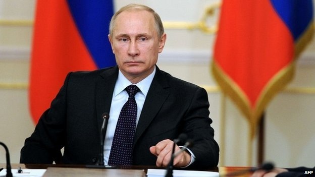 Tổng thống Putin: Nga đã cứu mạng Tổng thống Yanukovych - 1 Tổng thống Nga Putin. (Ảnh AFP)