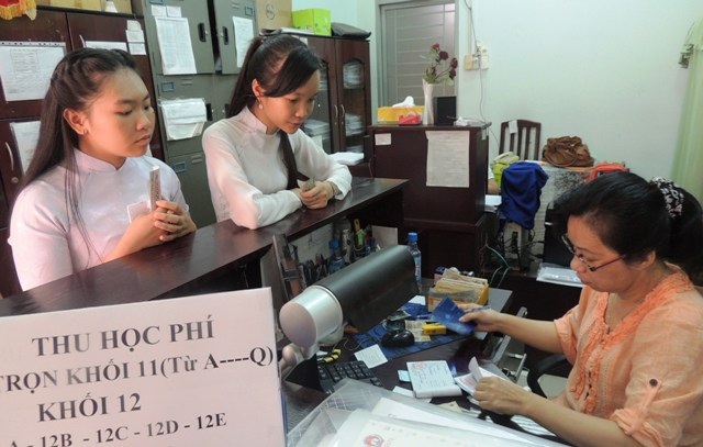 TPHCM: Triển khai thẻ học đường SSC đến 300 trường học - 1
Hàng trăm trường học ở TPHCM sẽ không còn thu học phí bằng tiền mặt. (Ảnh: Hoài Nam)