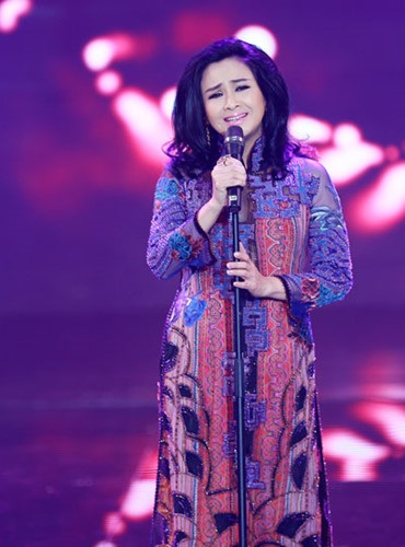 Thanh Lam và chuyện mượn áo dài của mẹ đi diễn khi mới 15 tuổi - 1 Thanh Lam xinh đẹp rạng ngời trong chiếc áo dài của NTK Minh Hạnh. Ảnh: NVCC.