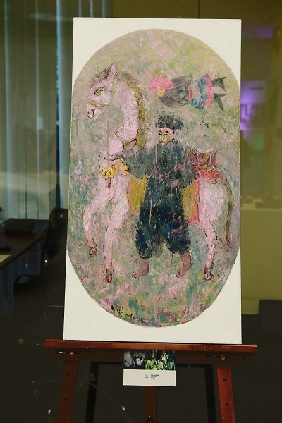 Nghệ sĩ Đoàn
Xuân Tặng với tranh Đông Hồ