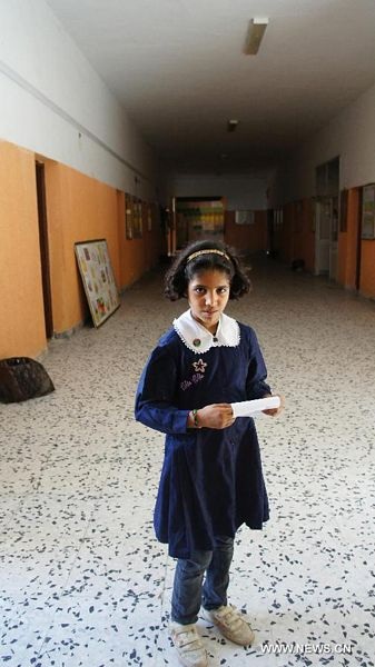 Trường học mở cửa trở lại tại Tripoli - 10