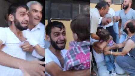 Cuộc đoàn tụ cảm động của hai cha con sau vụ tấn công ở Syria - 1 Người cha khóc trong hạnh phúc khi đoàn tụ với con trai bé bỏng.