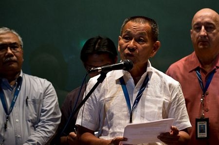 Một tấm biển thông báo chuyến bay MH370 bị trễ giờ tại sân bay quốc tế Bắc Kinh.