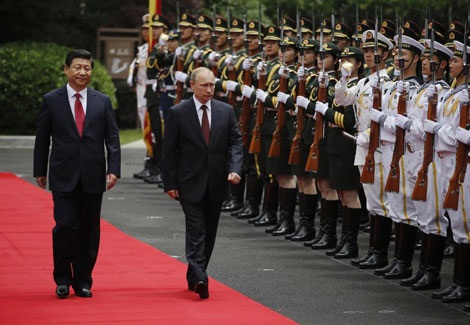 Putin thăm Trung Quốc, giành “cú hích ngoại giao” - 1 Lễ đón chính thức Tổng thống Putin diễn ra tại Thượng Hải hôm nay.
