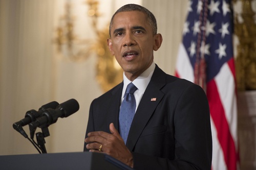 Những câu hỏi liên quan đến việc Mỹ không kích Iraq - 1 Tổng thống Mỹ Barack Obama phát biểu về việc cho phép không kích Iraq hôm 7/8. Ảnh: AFP/TTXVN