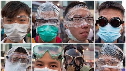 .... và đeo khẩu trang, kính bảo hộ để đối phó với lực lượng an ninh.