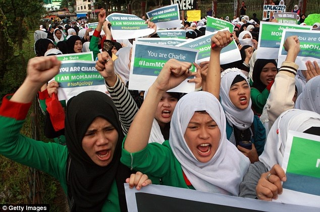 Cộng đồng Hồi giáo nổi giận trước tranh biếm họa mới về Mohammed - 3 Một tấm áp phích của tờ