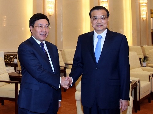 Phó Thủ tướng Phạm Bình Minh và Ủy viên Quốc vụ Dương Khiết Trì (Ảnh: VGP/Hải Minh)