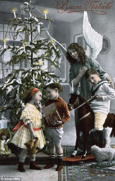 Một tấm bưu ảnh khắc họa niềm vui trẻ thơ khi được nhận quà Giáng sinh.