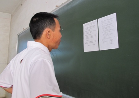 Phụ huynh đọc nội quy để căn dặn con thi tốt  - 4