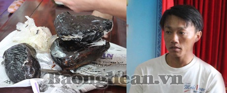 Mang 5,5kg thuốc phiện Nam tiến - 1 Đối tượng Đức cùng tang vật tại cơ quan điều tra (Ảnh: Minh Khôi - BNA)