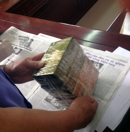 Tang vật thu giữ gồm 8 bánh heroin.