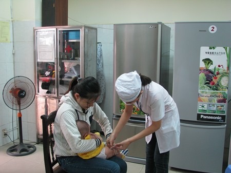 Trẻ được tiêm phòng vắc xin 