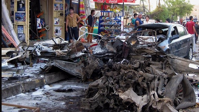 Đánh bom liên hoàn tại Iraq, 60 người thiệt mạng - 1 Một bom xe phát nổ ngay giữa khu phố đông đúc ở thủ đô Baghdad.