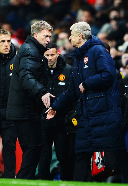 Tháng 2/2014: David Moyes và Wenger bắt tay sau khi hai đội hòa 0-0